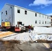 Contractors move second World War II-era barracks building at Fort McCoy