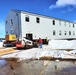 Contractors move second World War II-era barracks building at Fort McCoy