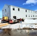 Contractors move second World War II-era barracks building at Fort McCoy