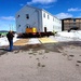 Contractors move second World War II-era barracks building at Fort McCoy