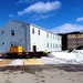 Contractors move second World War II-era barracks building at Fort McCoy