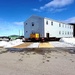 Contractors move second World War II-era barracks building at Fort McCoy