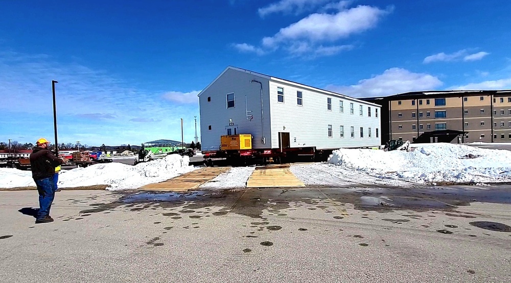 Contractors move second World War II-era barracks building at Fort McCoy