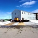 Contractors move second World War II-era barracks building at Fort McCoy