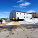 Contractors move second World War II-era barracks building at Fort McCoy