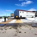 Contractors move second World War II-era barracks building at Fort McCoy