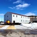 Contractors move second World War II-era barracks building at Fort McCoy