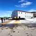 Contractors move second World War II-era barracks building at Fort McCoy