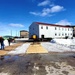 Contractors move second World War II-era barracks building at Fort McCoy