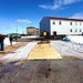 Contractors move second World War II-era barracks building at Fort McCoy