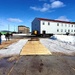 Contractors move second World War II-era barracks building at Fort McCoy