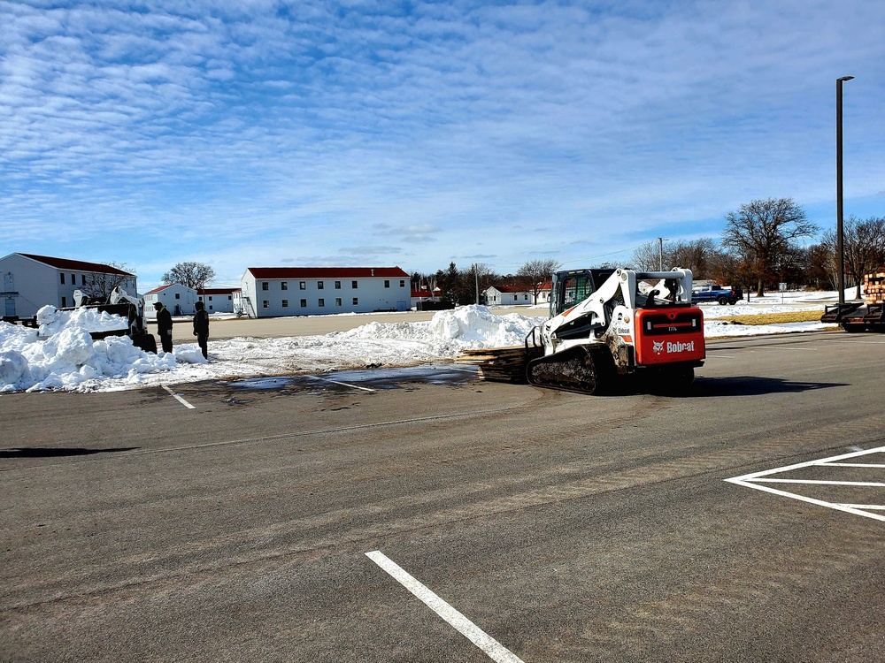 Contractors move second World War II-era barracks building at Fort McCoy