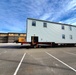 Contractors move second World War II-era barracks building at Fort McCoy