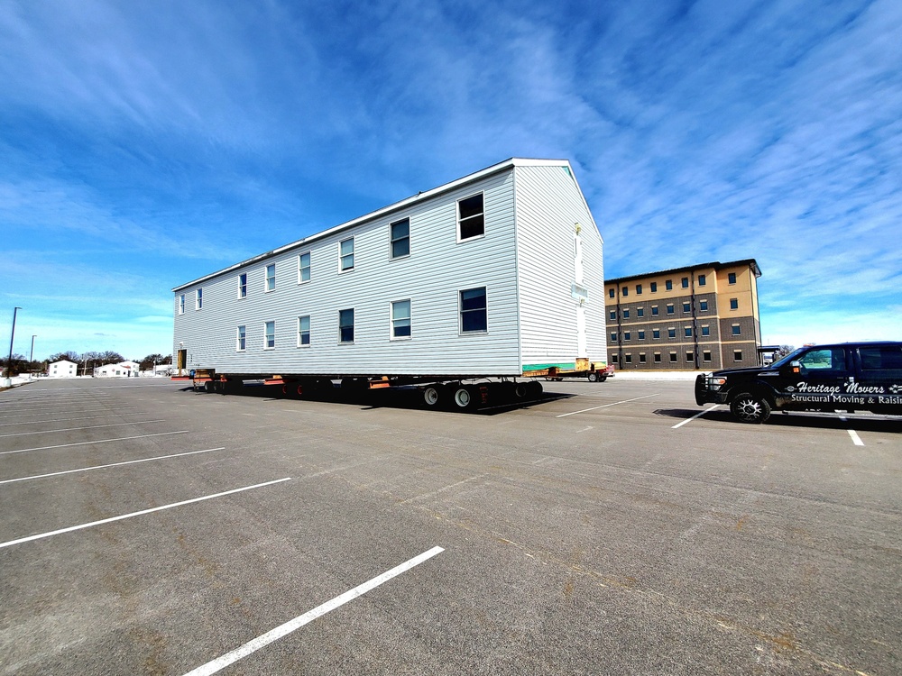 Contractors move second World War II-era barracks building at Fort McCoy