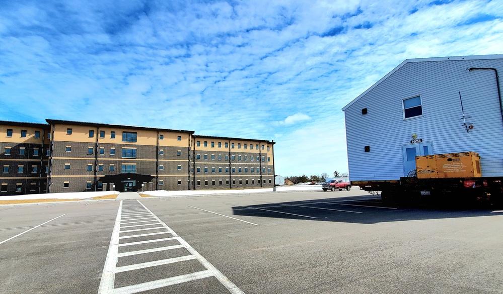 Contractors move second World War II-era barracks building at Fort McCoy