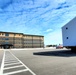 Contractors move second World War II-era barracks building at Fort McCoy