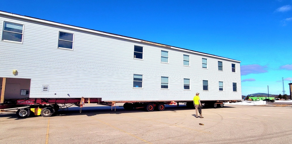 Contractors move second World War II-era barracks building at Fort McCoy