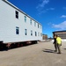 Contractors move second World War II-era barracks building at Fort McCoy