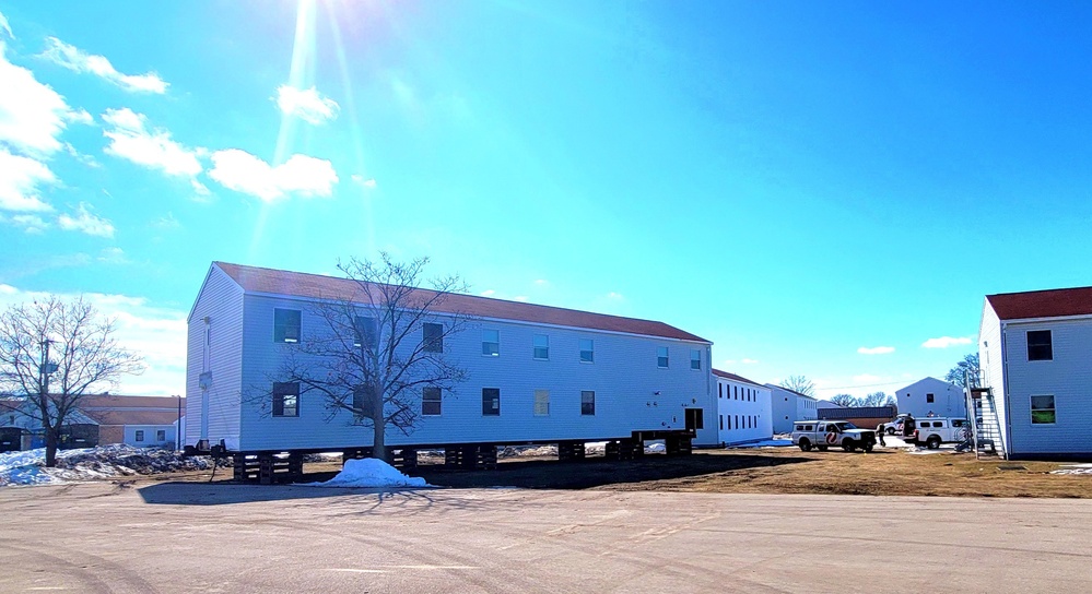 Contractors move second World War II-era barracks building at Fort McCoy