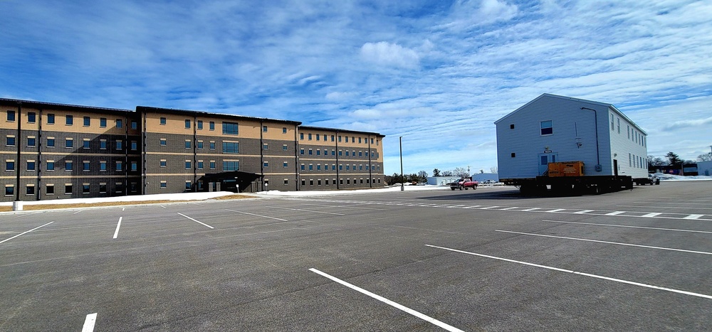 Contractors move second World War II-era barracks building at Fort McCoy