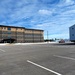 Contractors move second World War II-era barracks building at Fort McCoy