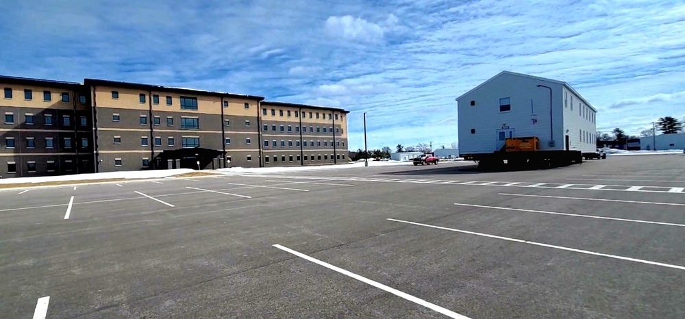 Contractors move second World War II-era barracks building at Fort McCoy