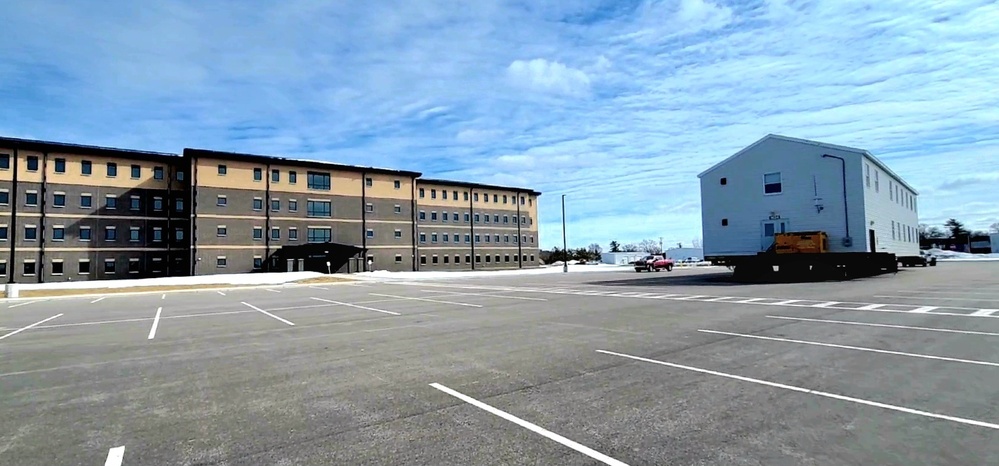 Contractors move second World War II-era barracks building at Fort McCoy