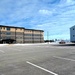 Contractors move second World War II-era barracks building at Fort McCoy