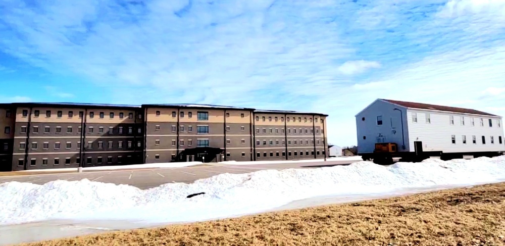 Contractors move second World War II-era barracks building at Fort McCoy