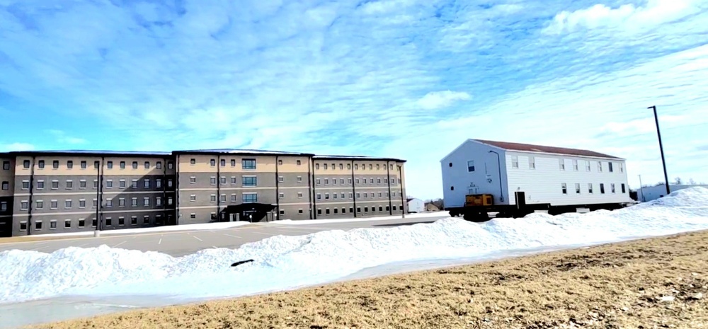 Contractors move second World War II-era barracks building at Fort McCoy