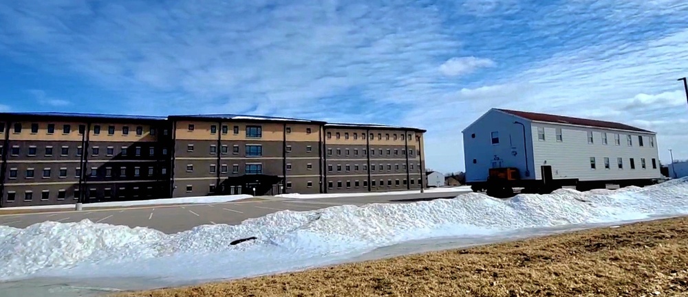 Contractors move second World War II-era barracks building at Fort McCoy