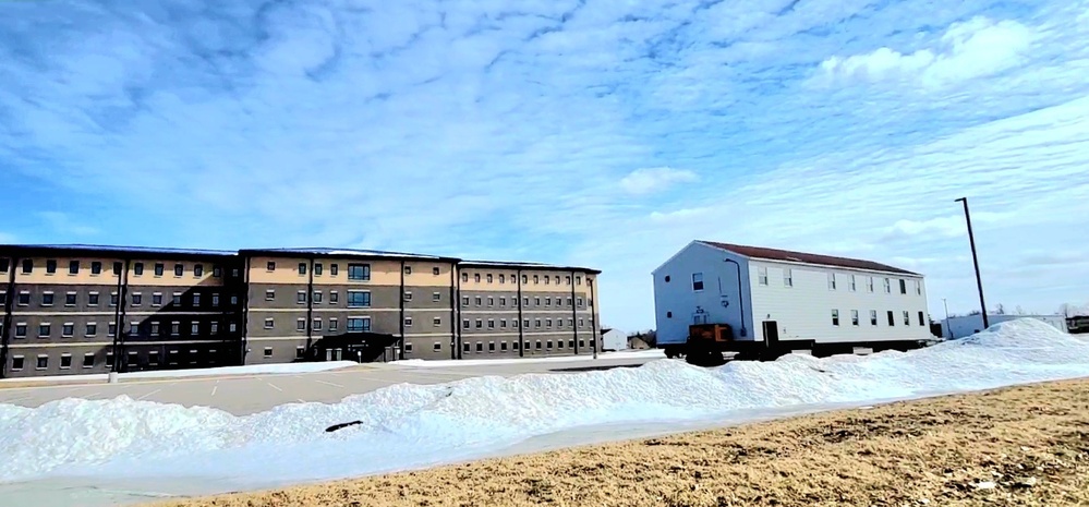 Contractors move second World War II-era barracks building at Fort McCoy