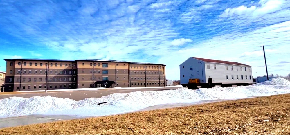 Contractors move second World War II-era barracks building at Fort McCoy