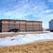 Contractors move second World War II-era barracks building at Fort McCoy