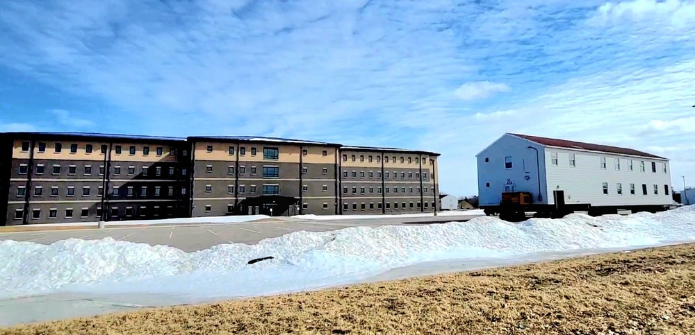 Contractors move second World War II-era barracks building at Fort McCoy