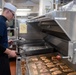 USS Ronald Reagan (CVN 76) Sailors conduct food preparation
