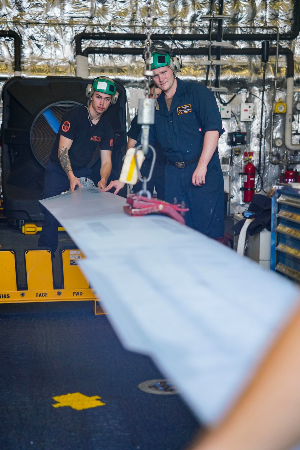 SAILORS ASSIGNED TO HSM 35 CONDUCTS HELO MAINTENANCE