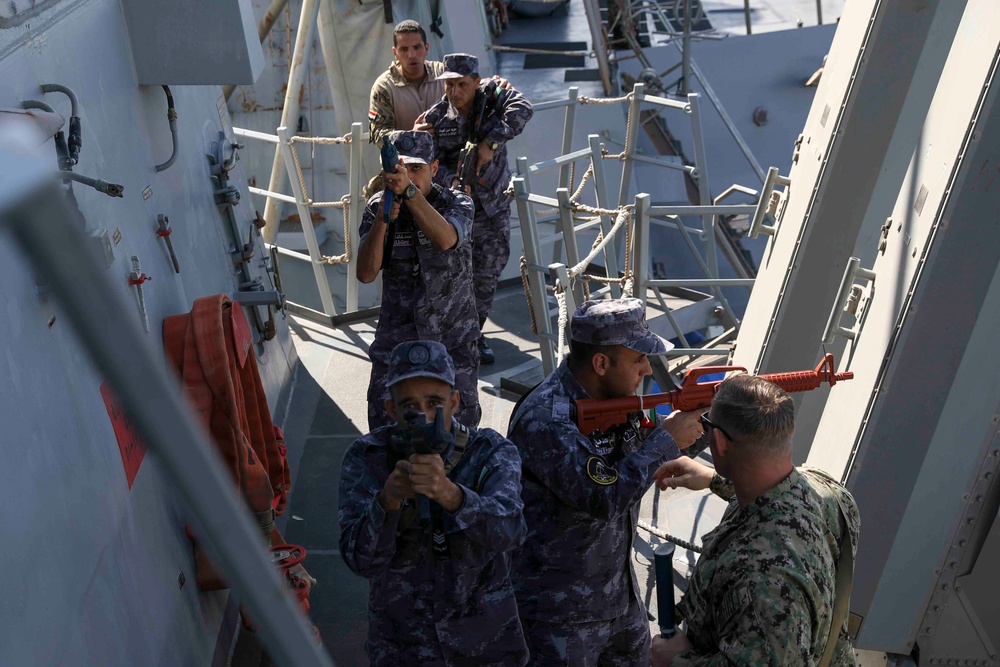 USS Truxtun practices vessel boarding procedures during IMX 23