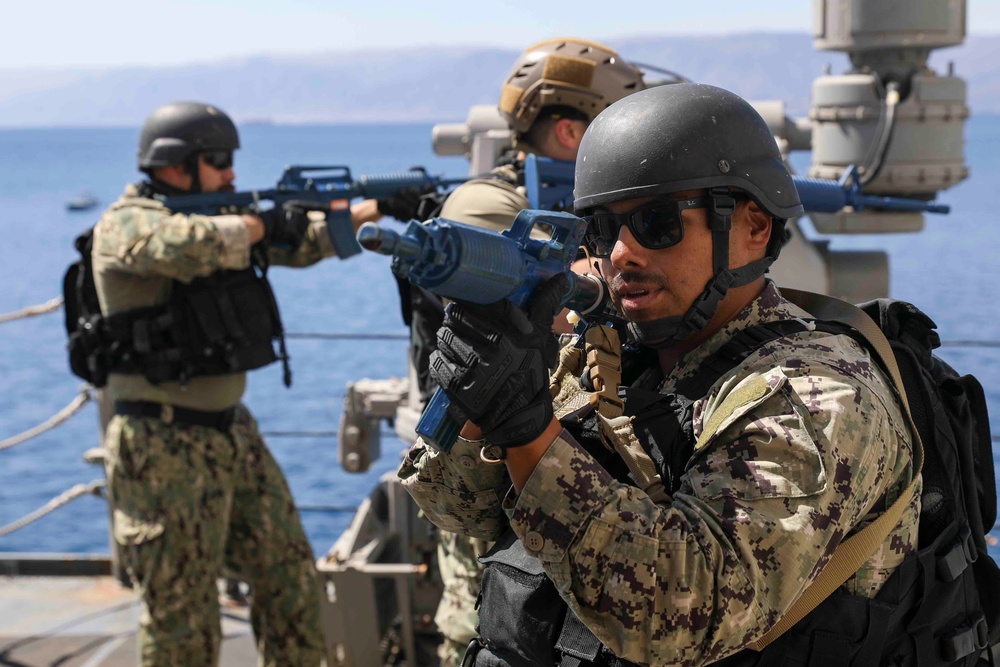 USS Truxtun practices vessel boarding procedures during IMX 23