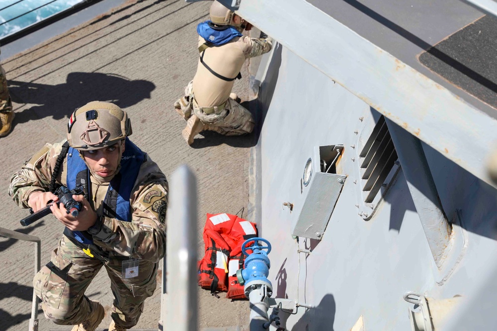 USS Truxtun practices vessel boarding procedures during IMX 23