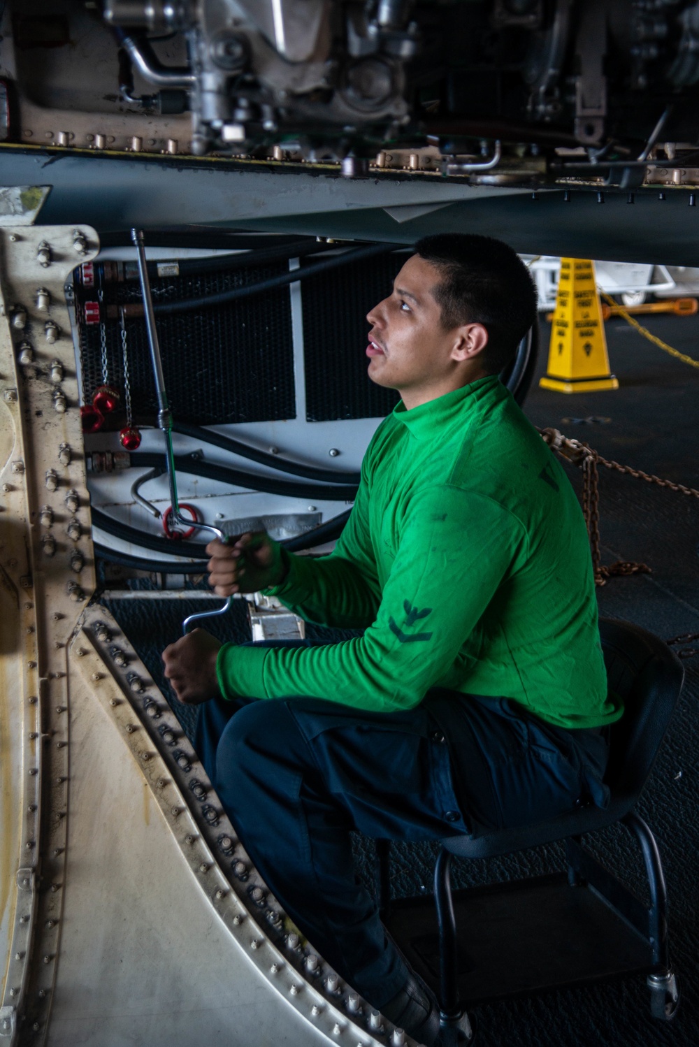 Sailor Conducts Routine Maintenance