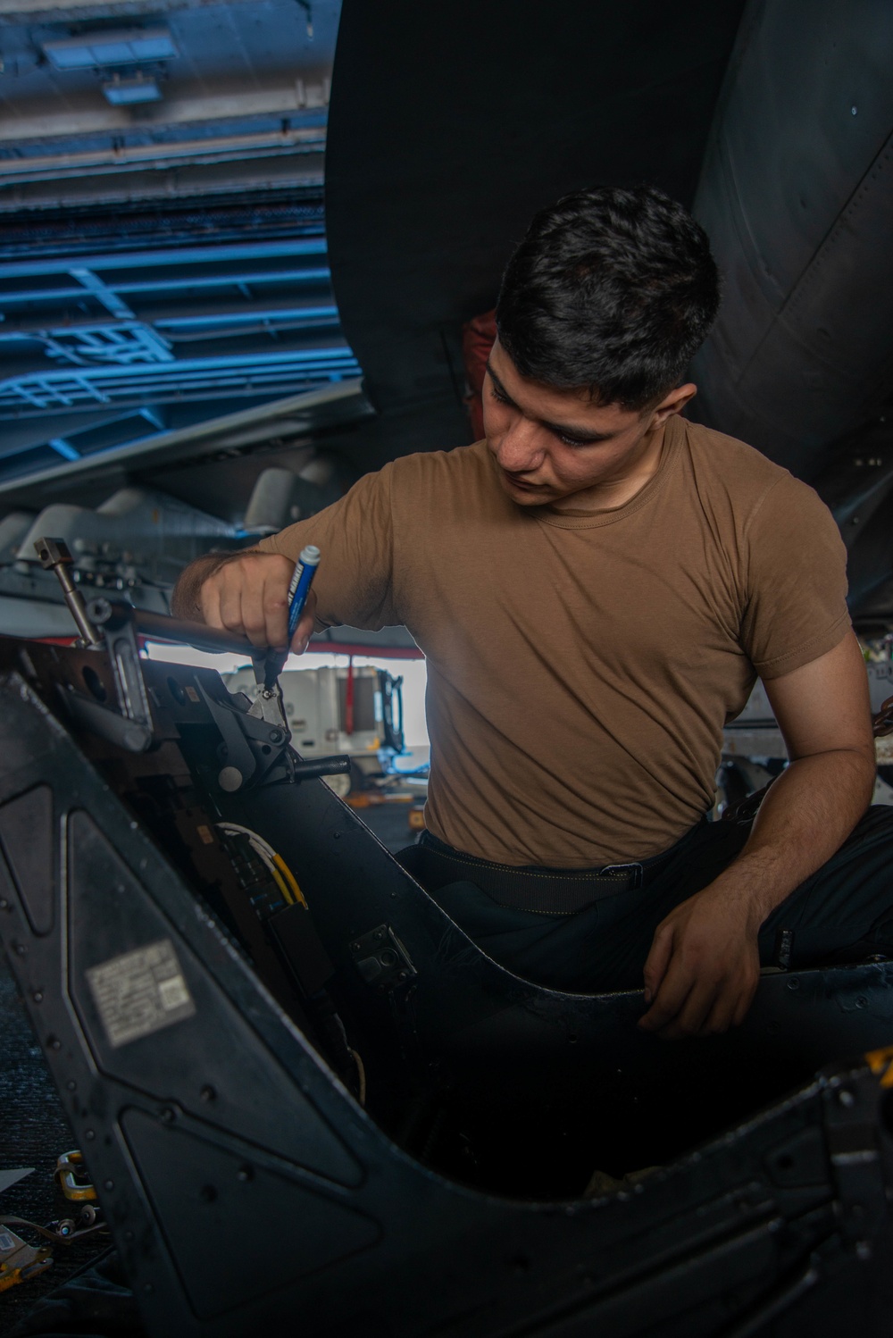 Sailor Performs Routine Maintenance