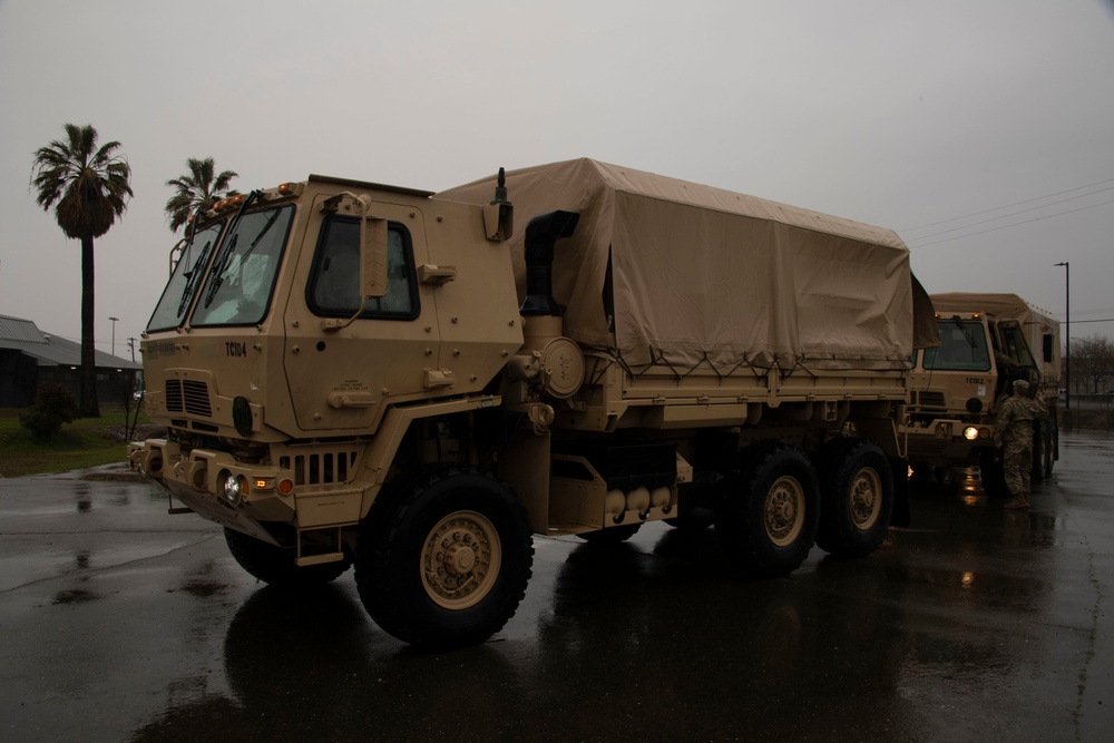 California National Guard stages troops and  highwater vehicles in preparation for emergency flood response