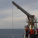 USS Thomas Hudner (DDG 116) lower a rigid-hulled inflatable boat