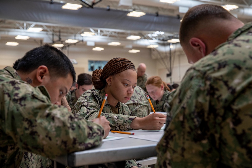 Abraham Lincoln Sailors take advancement exams