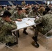 Abraham Lincoln Sailors take advancement exams