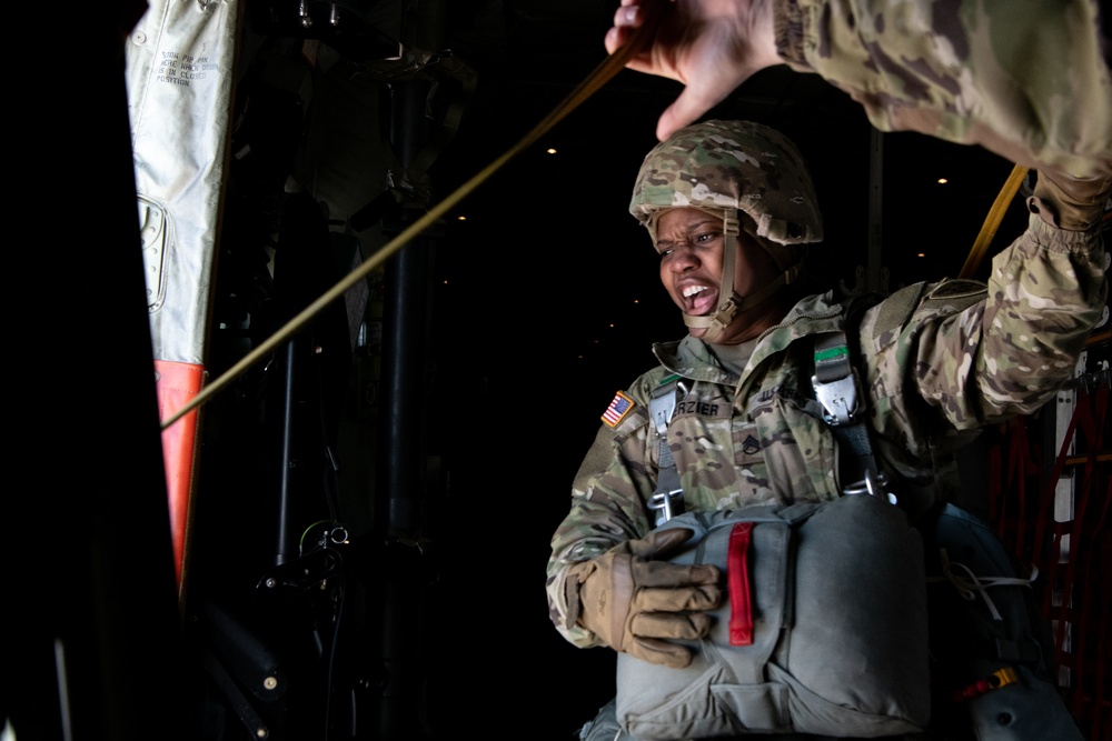 Ladies of 11th Airborne leap during all-women jump