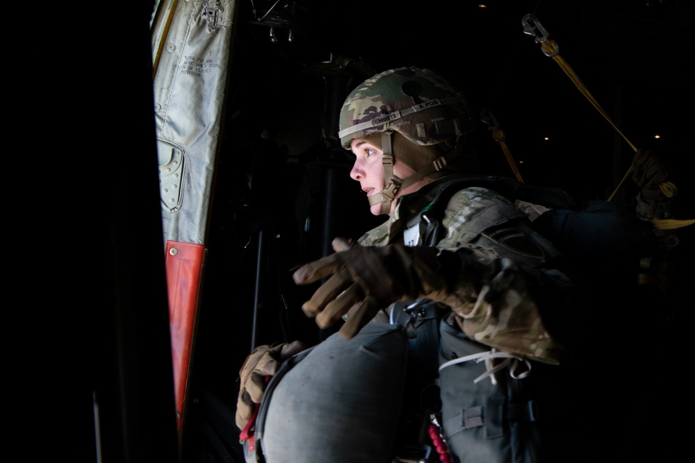 Ladies of 11th Airborne leap during all-women jump