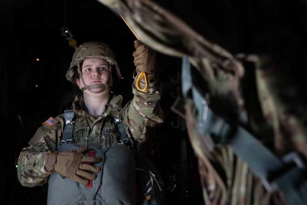 Ladies of 11th Airborne leap during all-women jump