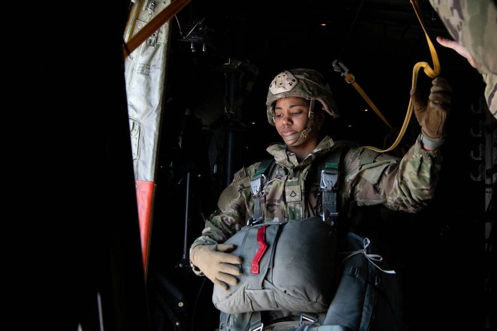 Ladies of 11th Airborne leap during all-women jump